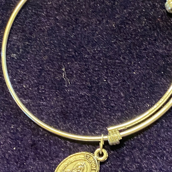 5/$50 Adjustable Silver Bracelet
With a silver double sided Medallion - Picture 7 of 10